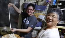 Making Japanese food with her host mother